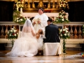 Gli sposi insieme alla figlia durante il matrimonio nella Chiesa di Santa Maria Assunta in Cielo ad Ariccia